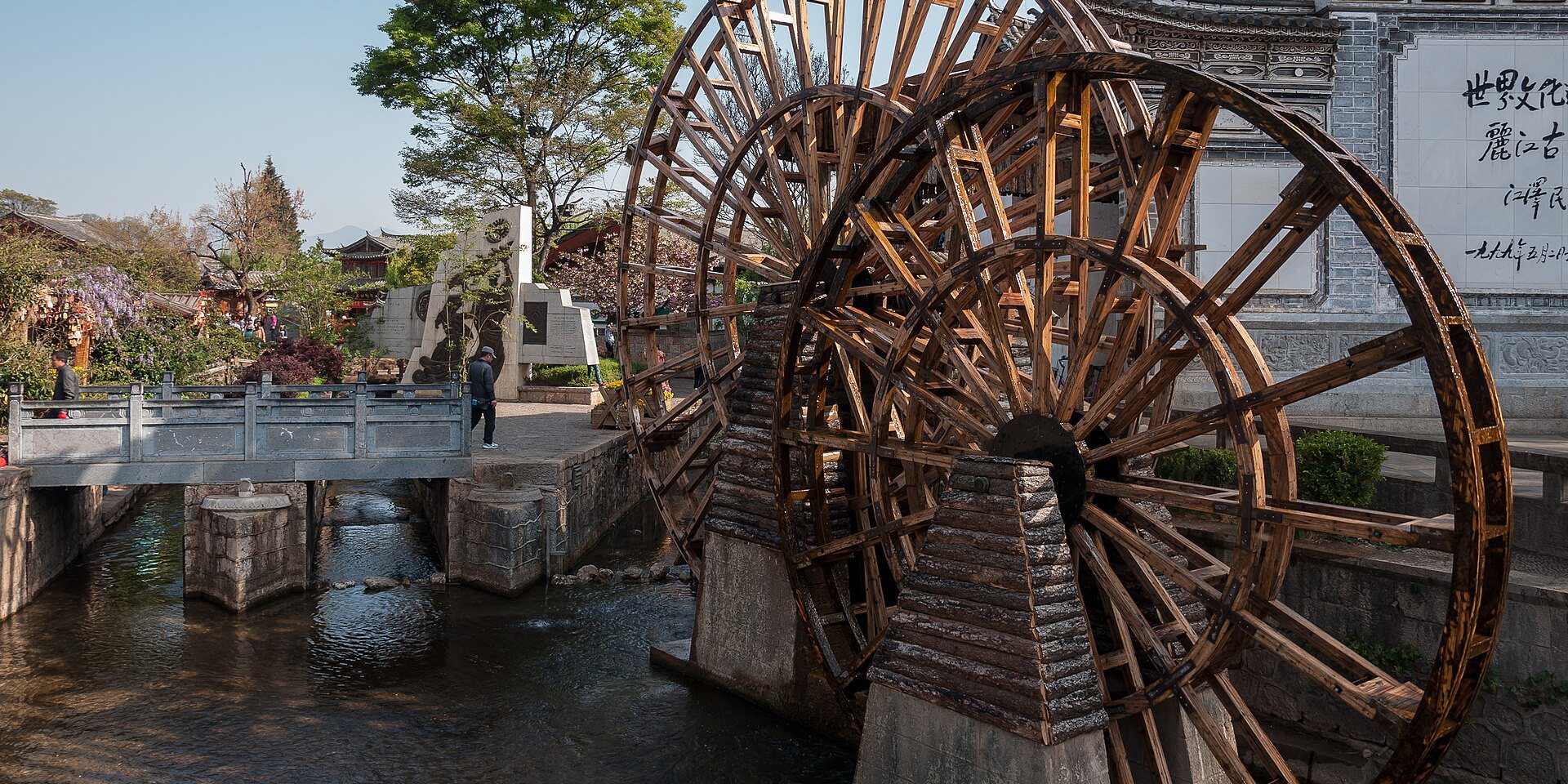 Lijiang Old Town water wheels and bluestone lanes